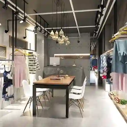 Diseño de Interiores Comercial y Retail en Iztapalapa Interior de tienda de ropa moderna con acabados de vanguardia, iluminación dirigida y mobiliario a medida. Diseño de Interiores Comercial en la alcaldía Iztapalapa, CDMX.